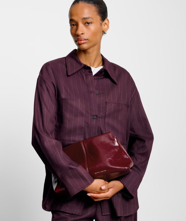 LAILA TEXTURED PATENT CLUTCH | CHERRY