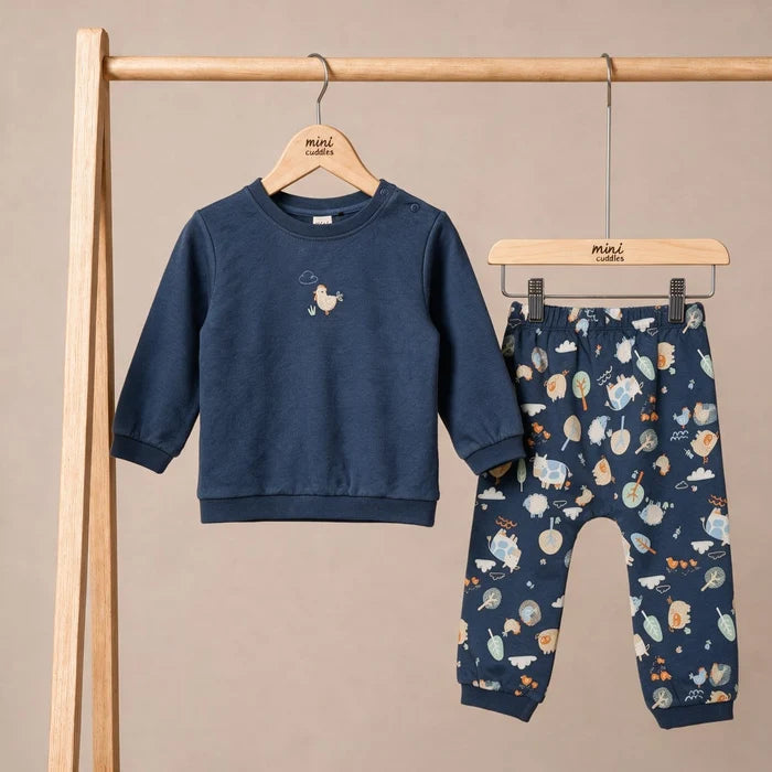 Baby boys animal print top and blue bottoms