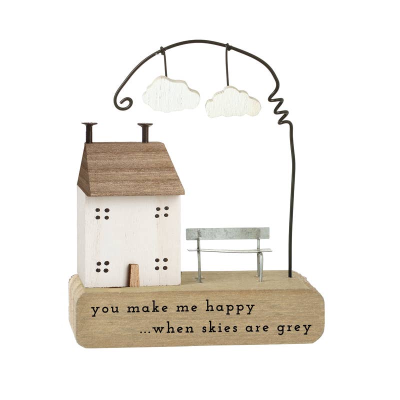 Wooden House On Block With Cloud