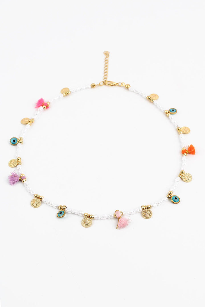 PEARL CHARM AND TASSEL NECKLACE