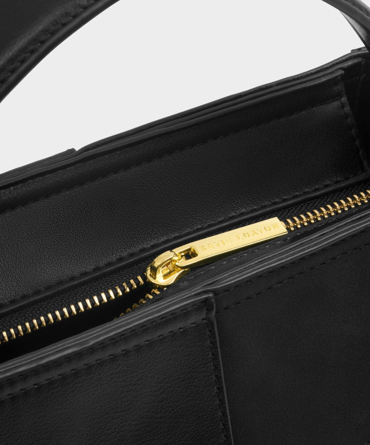 TAYA WOVEN SUEDETTE TOP HANDLE BAG BLACK