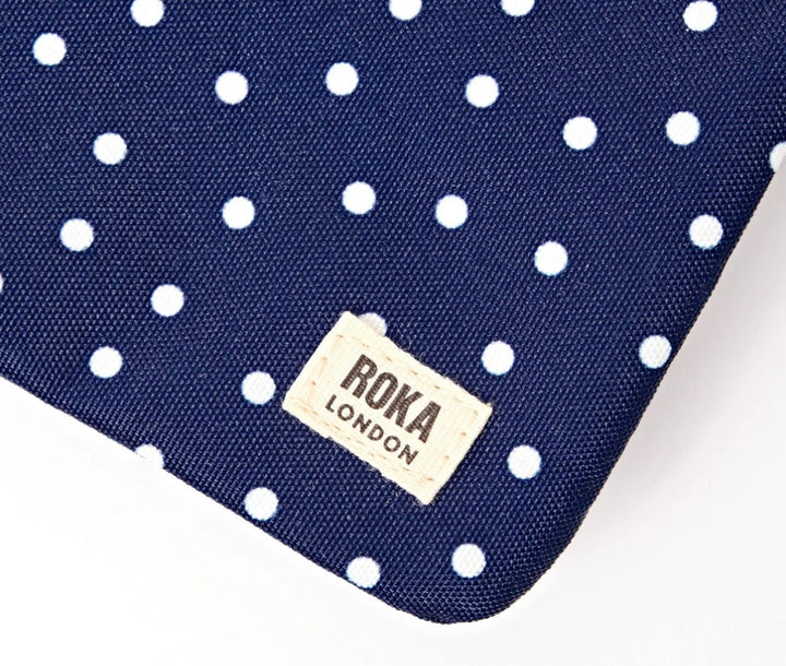CARNABY B RECYCLED CANVAS SLING BAG NAVY POLKA DOT