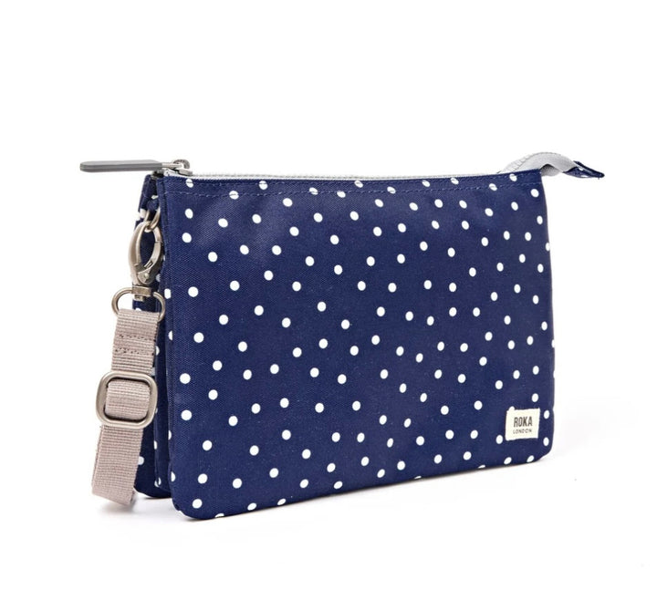 CARNABY B RECYCLED CANVAS SLING BAG NAVY POLKA DOT
