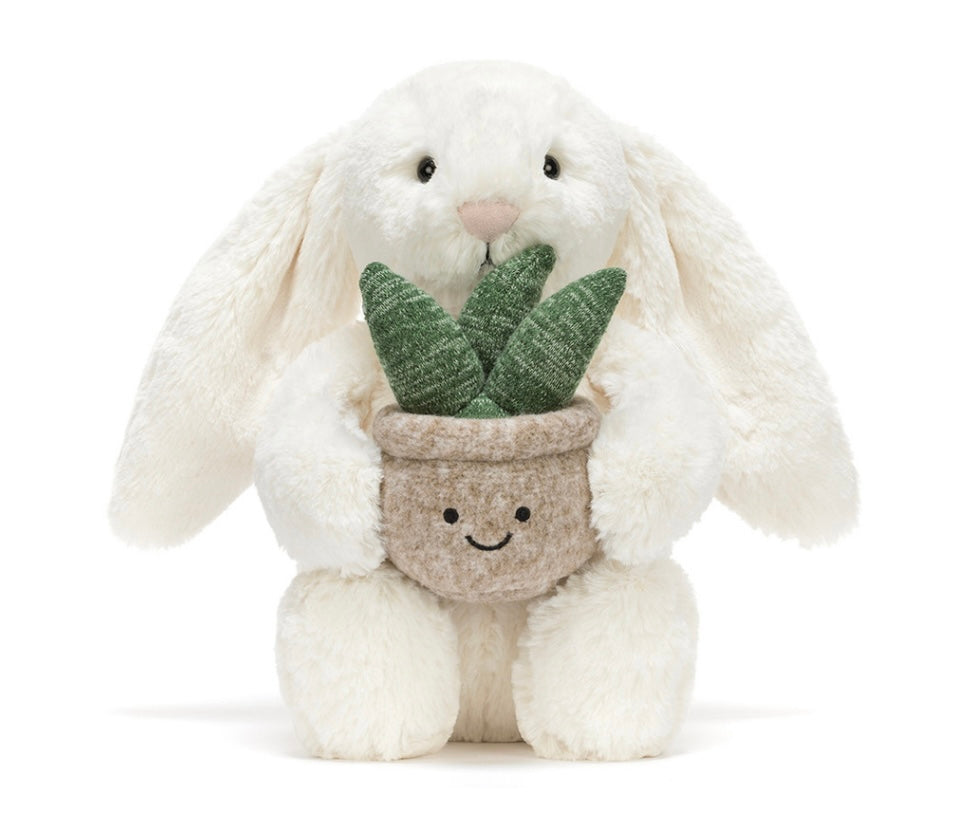 CREAM BUNNY WITH PLANT