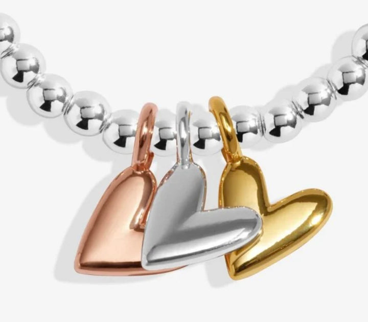 A LITTLE CHARMED MOMENTS SUPER SISTER BRACELET