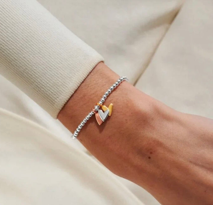 A LITTLE CHARMED MOMENTS SUPER SISTER BRACELET