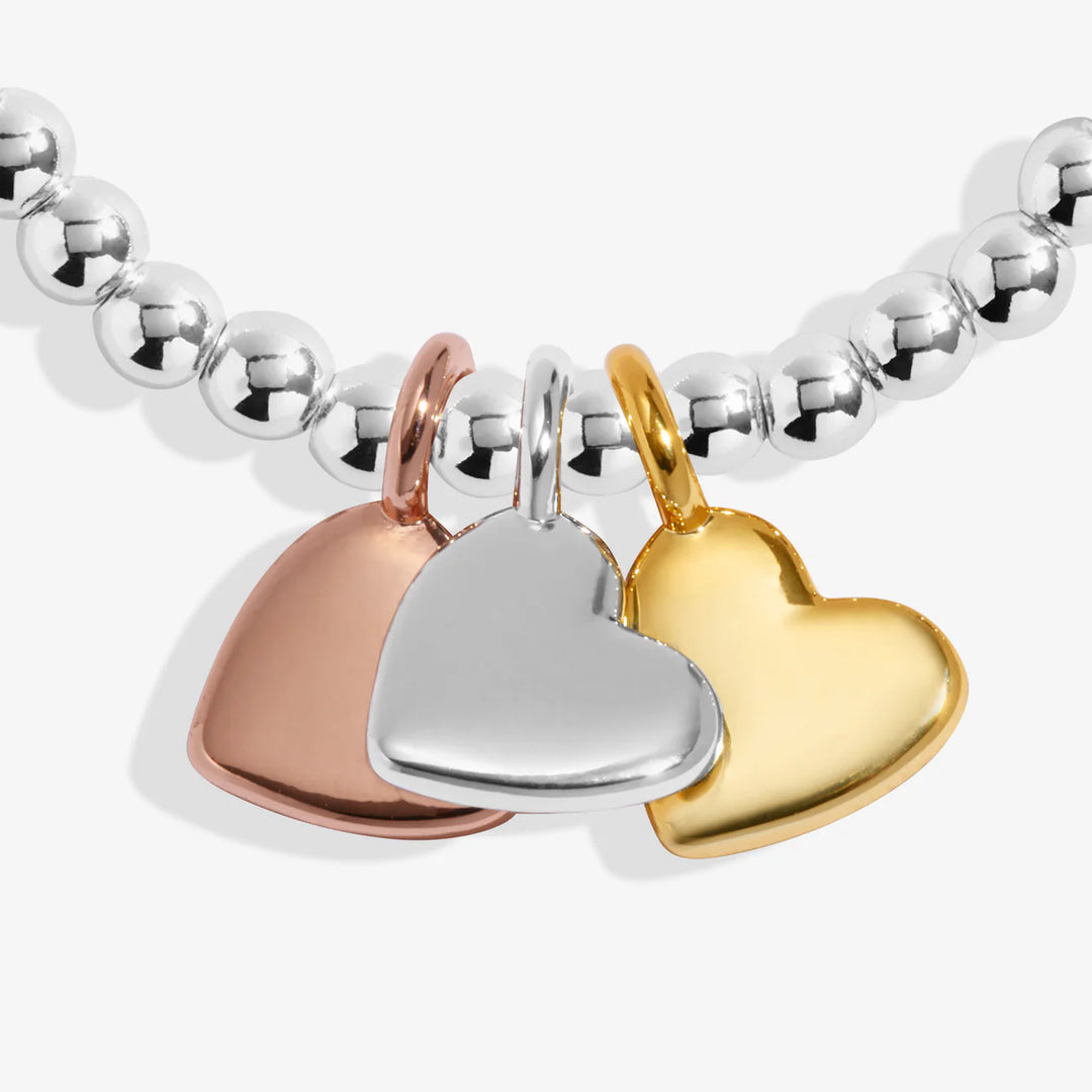 A LITTLE CHARMED MOMENTS HEART OF GOLD BRACELET