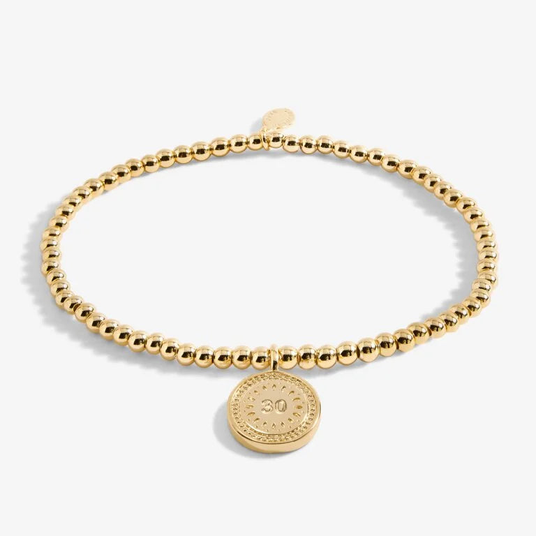 A LITTLE 30TH BIRTHDAY GOLD BRACELET