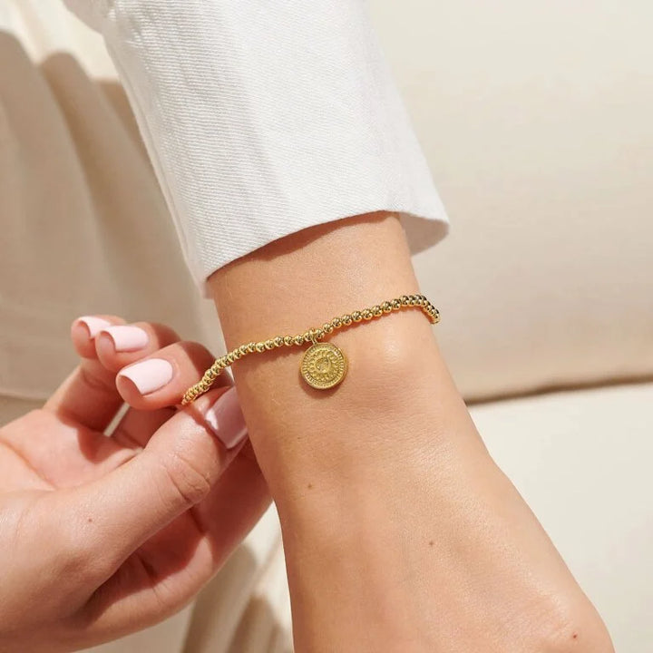 A LITTLE 60TH BIRTHDAY GOLD BRACELET