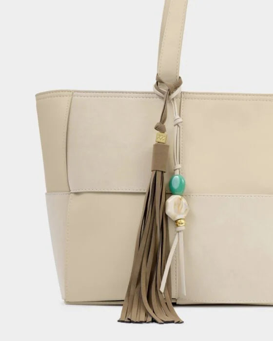 OVERSIZED SUEDETTE TASSLE BAG CHARM TAUPE