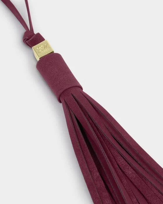 OVERSIZED SUEDETTE TASSEL BAG CHARM CHERRY