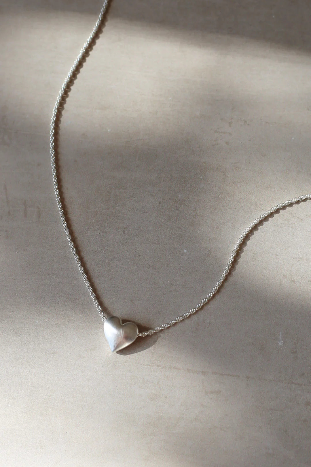 SILVER EMBRACE NECKLACE