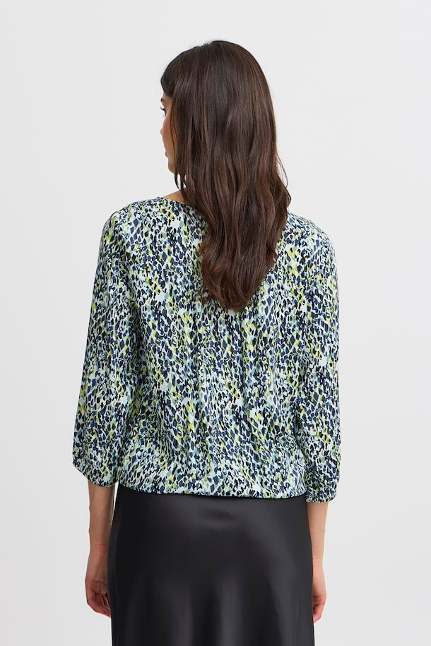 GREEN BAY PRINT FLOWY BLOUSE